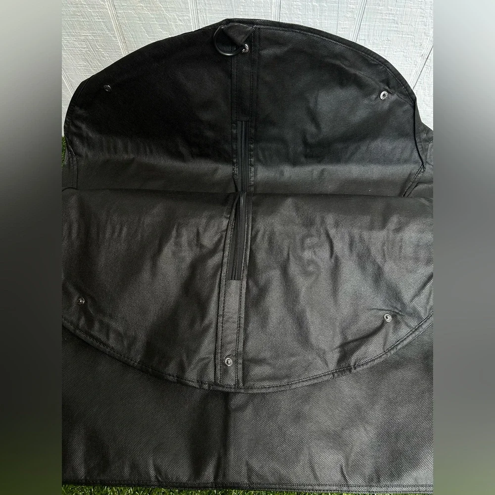 Tumi Travel Garment Bag black suits and dresses, during travel NEW 52” long 23”